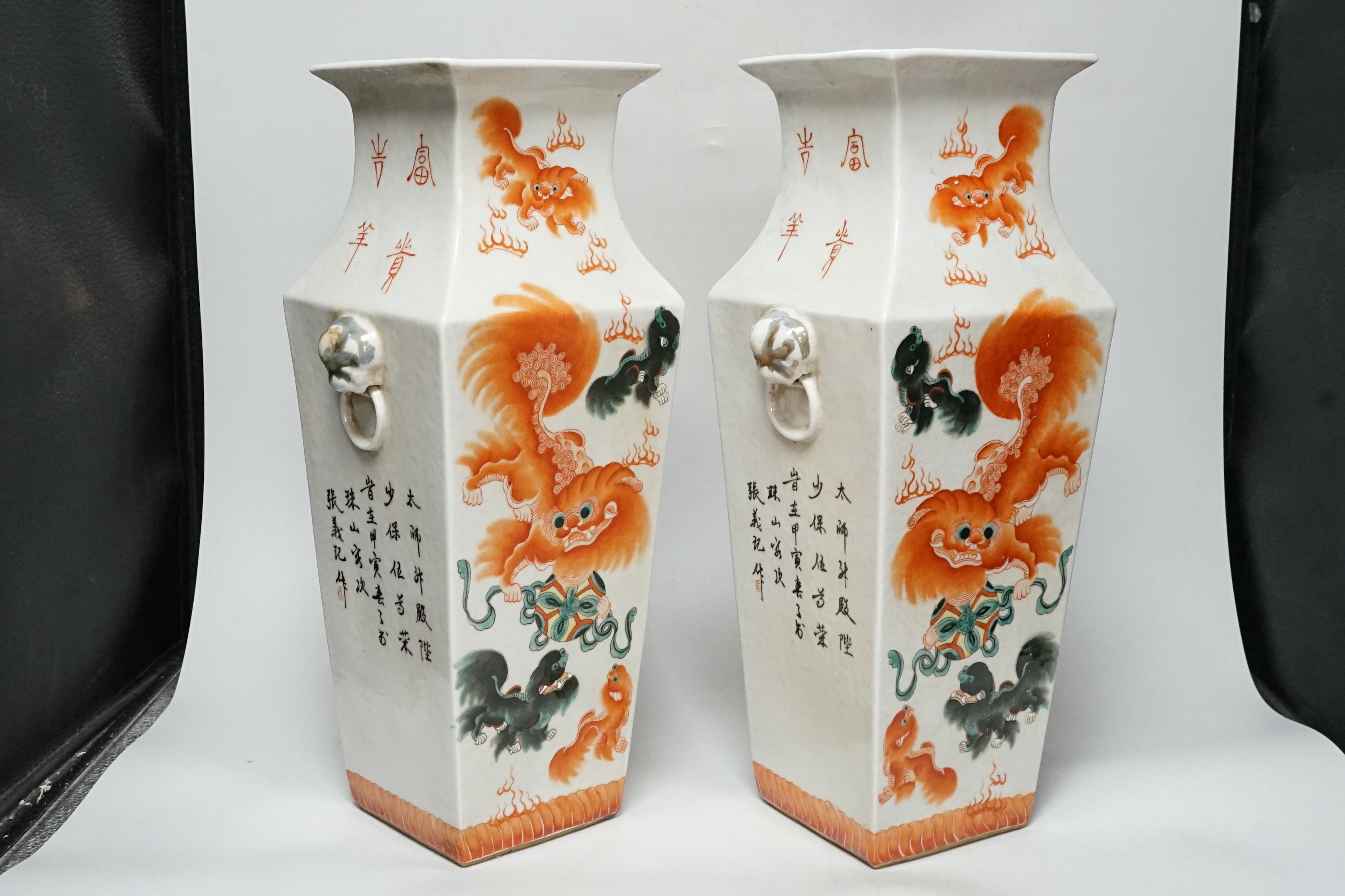 A pair of Chinese enamelled porcelain ‘fish’ square baluster vases, inscribed, 42cm high